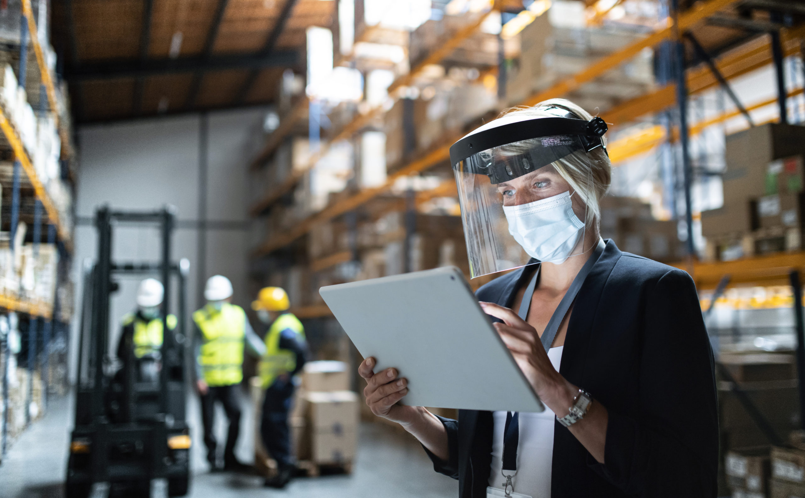 lead image for ppe inventory management article with subjects in the image wearing ppe as well